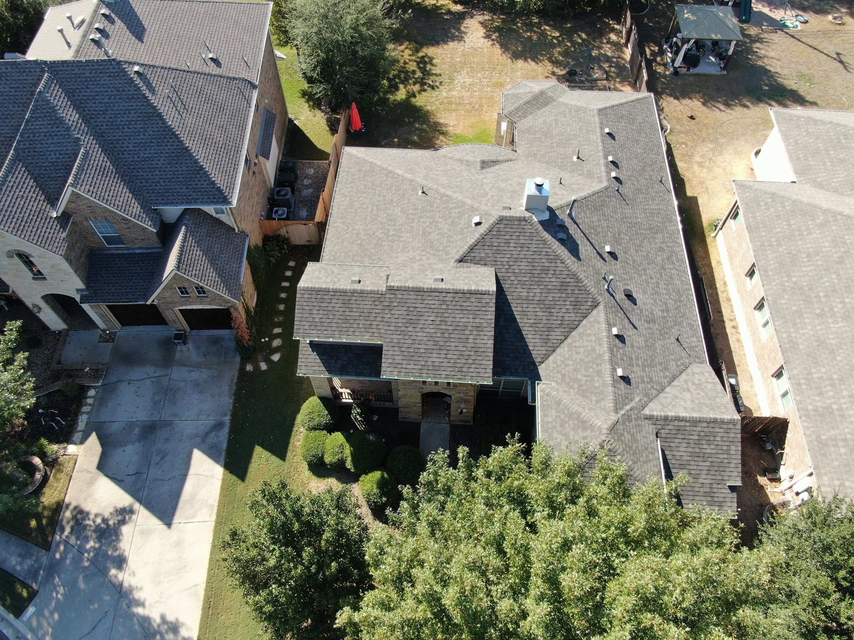 916e695b649a-certainteed-landmark-roof-installed-by-storm-guard-roofing-and-construction-after-hailstorm-forest-creek-neighborhood-round-rock-tx.jpg