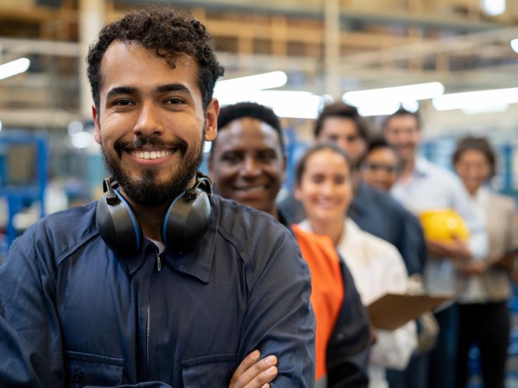 A group of happy Kaycan employees